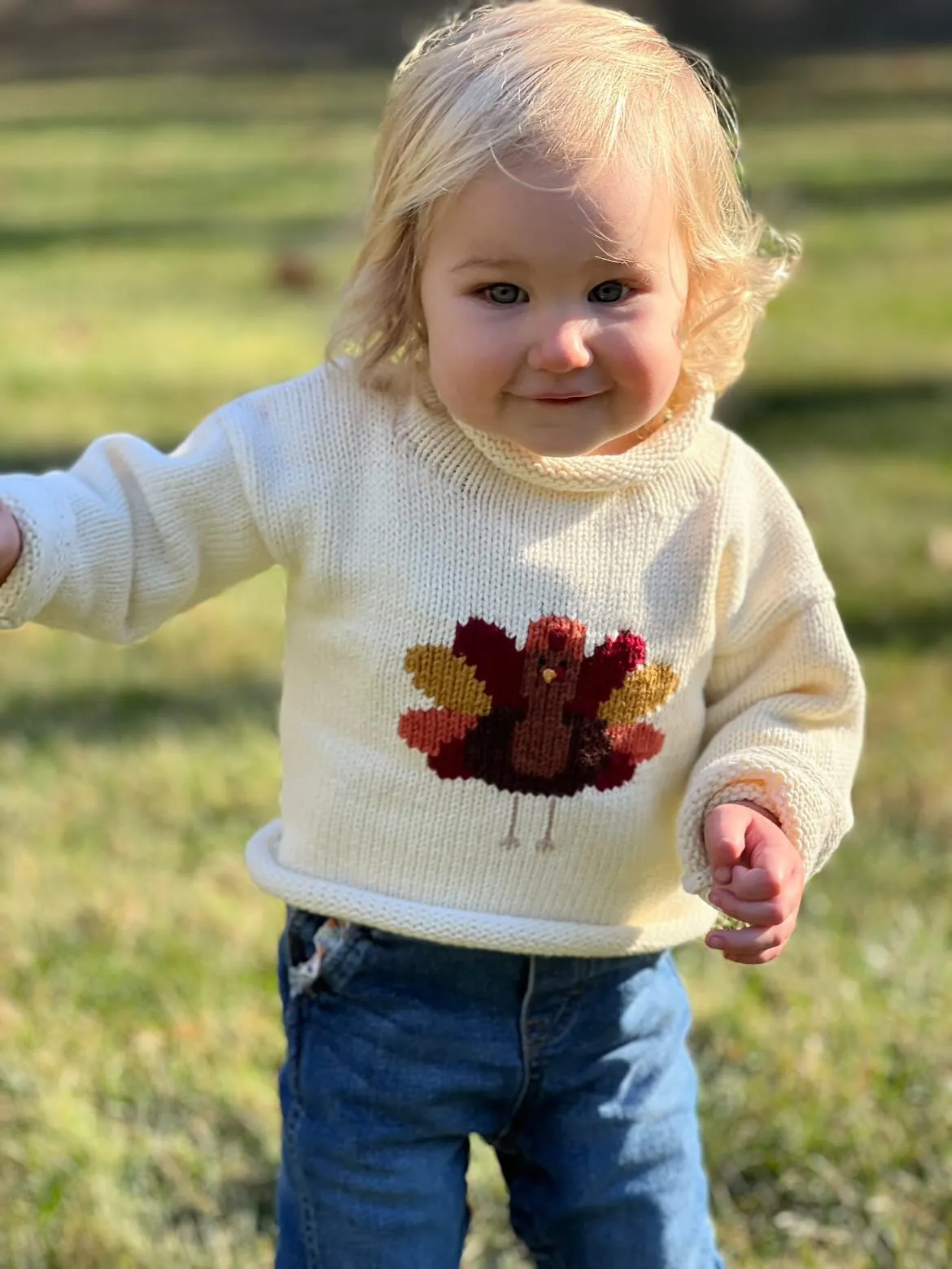 Ivory Turkey Roll Neck Sweater